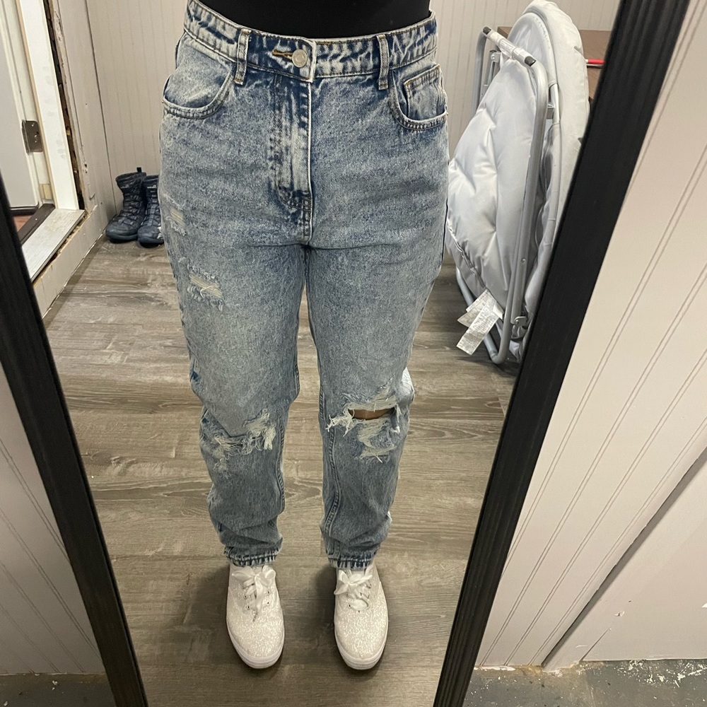 She in size large jeans